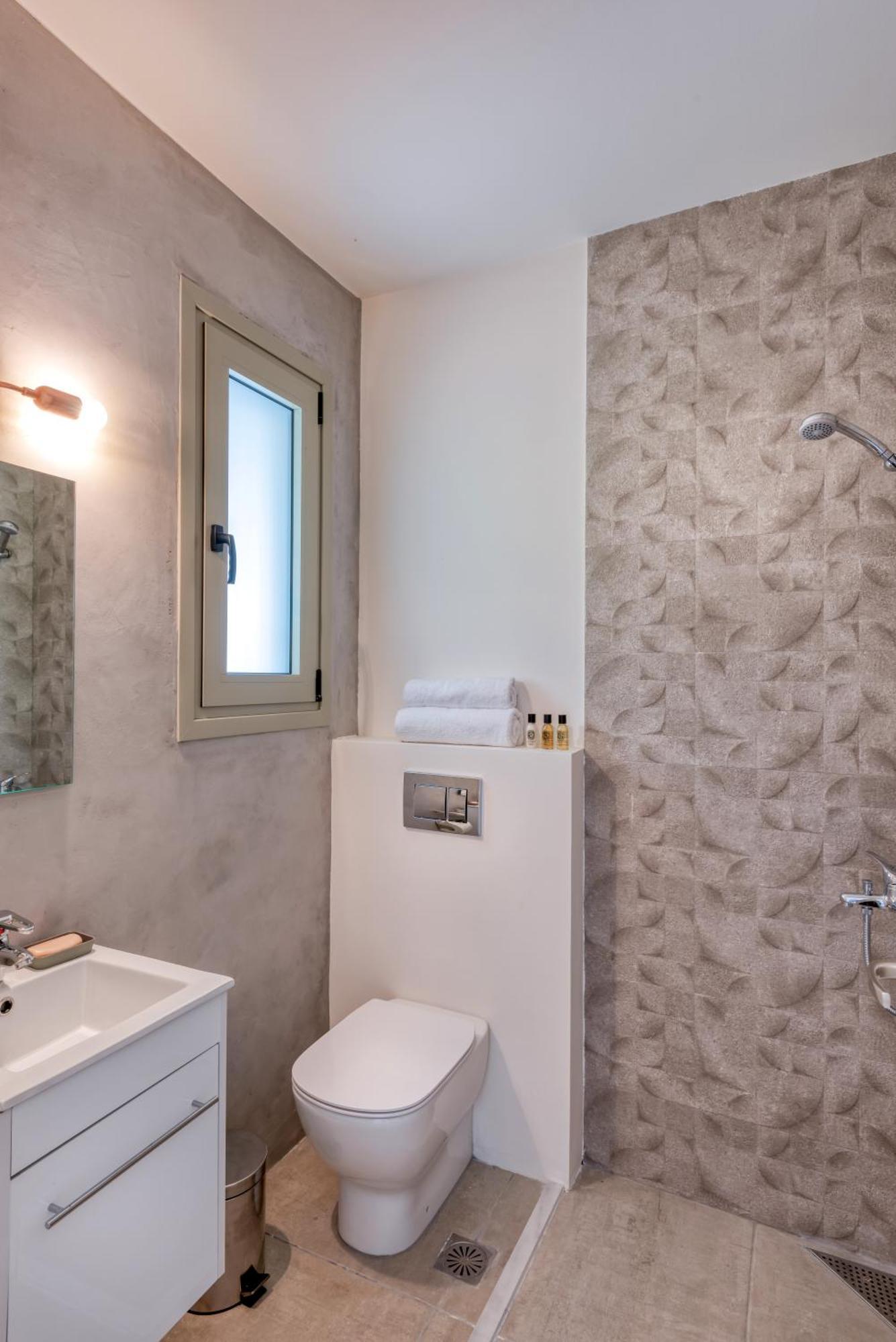 Saronis Suites Saronida 部屋 写真